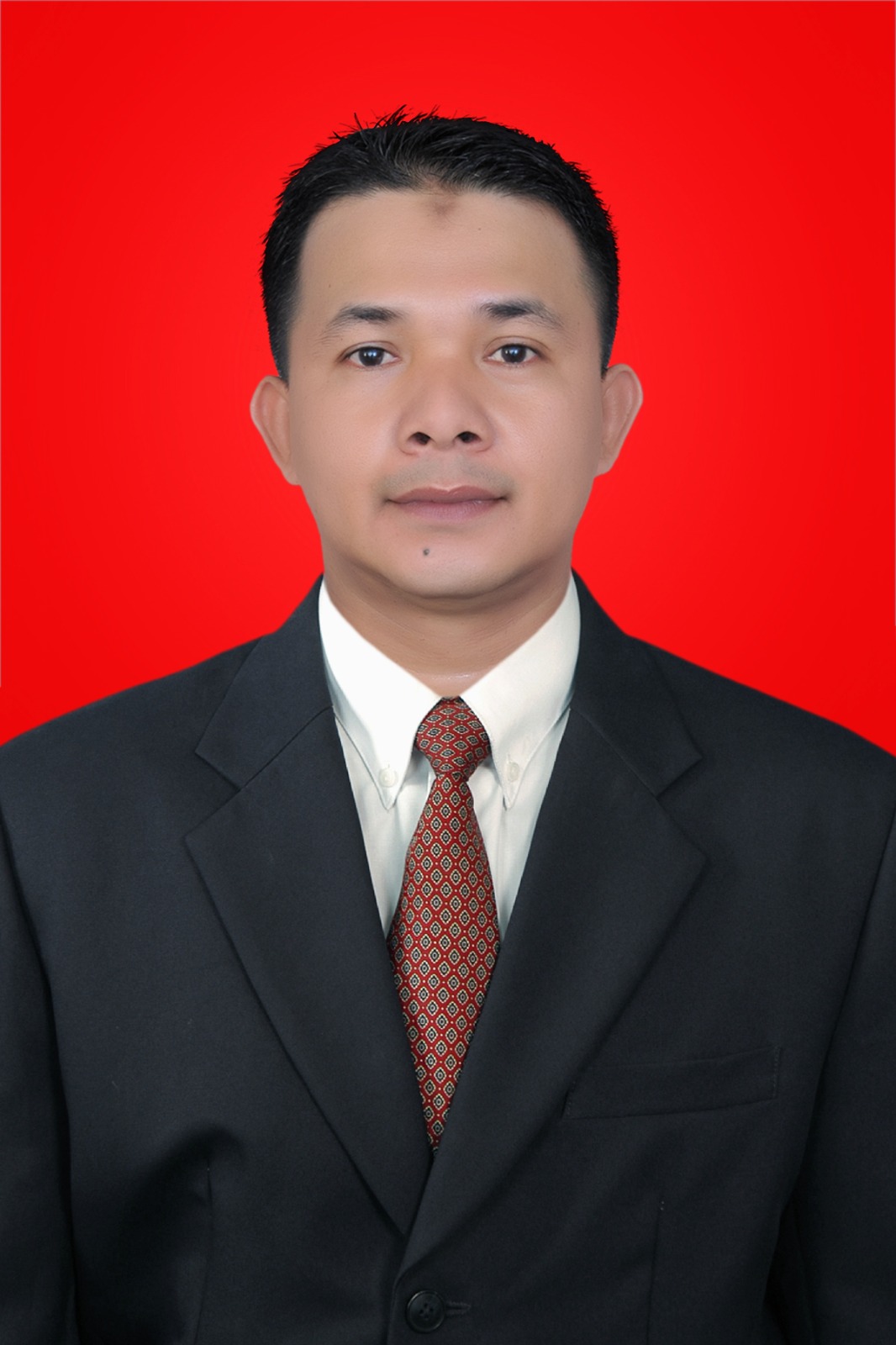 Dr. Edi Suandi, MM